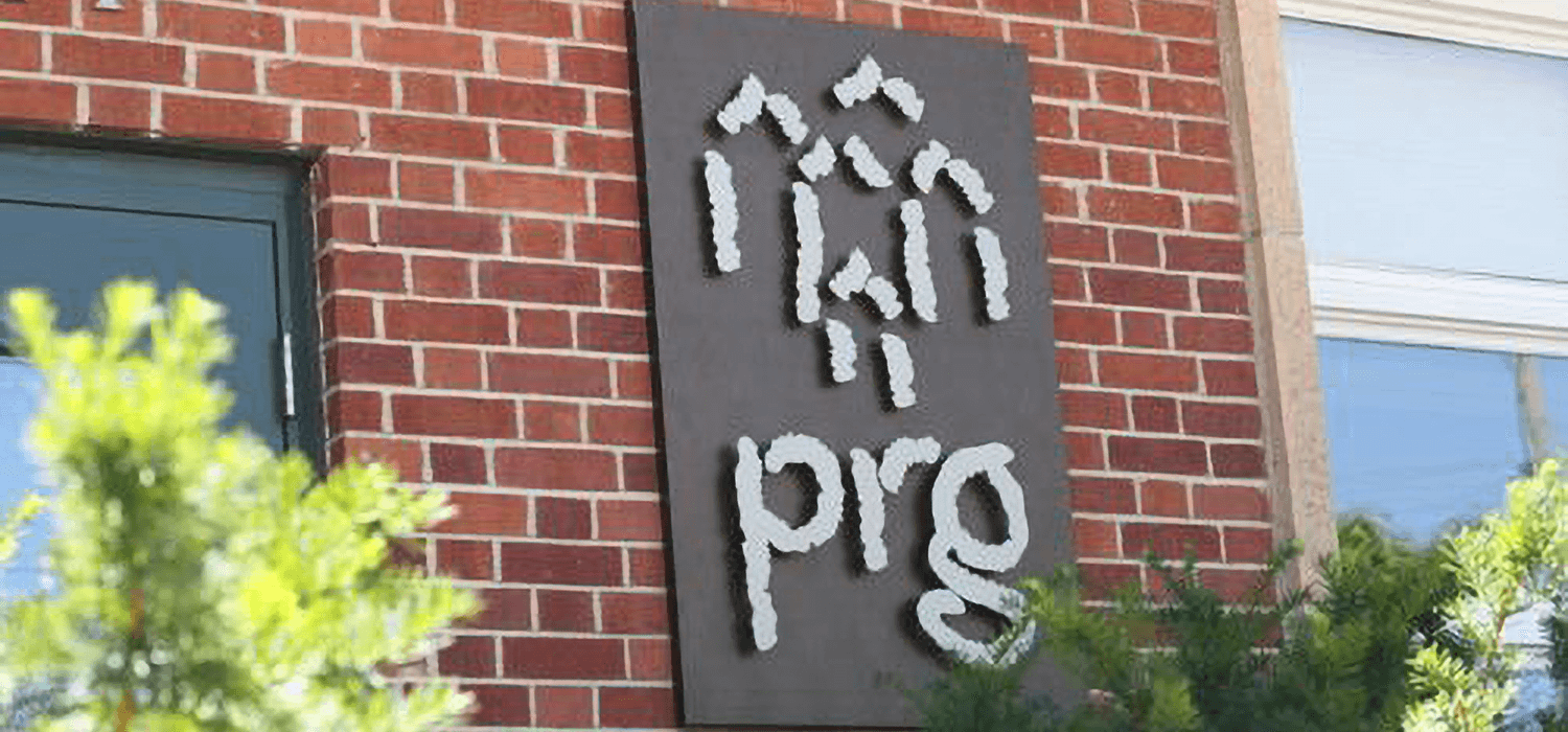 PRG logo displayed on their building