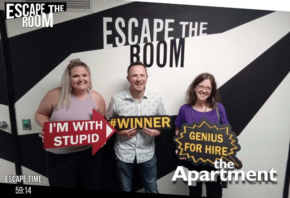 A photo of a group of Sunrise employees at an escape room