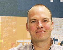 A headshot of Andy Larson