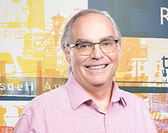 A headshot of Eric Schurr