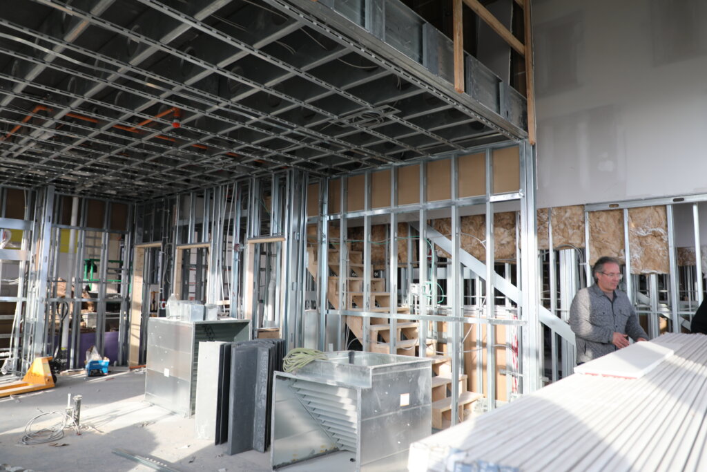 A penthouse unit under construction inside an apartment building.