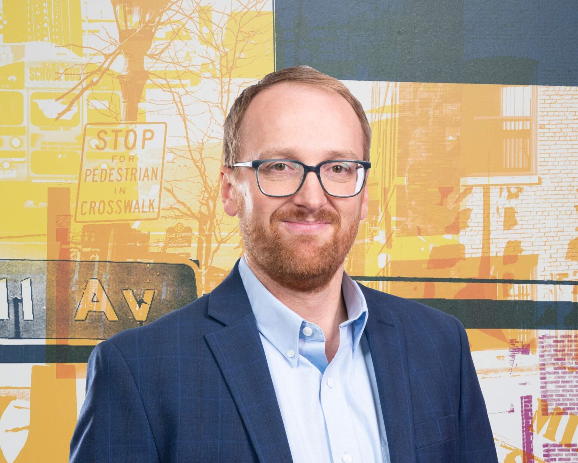 A headshot of Andy Carlson