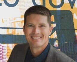 A headshot of Damon Sehr