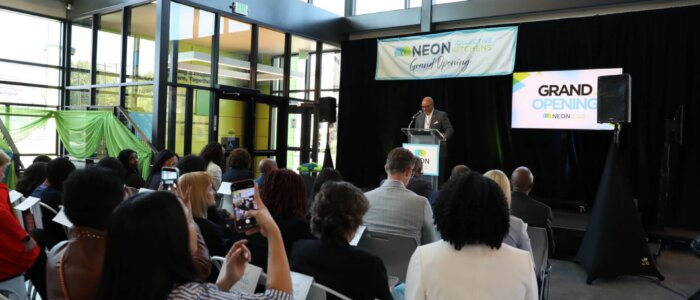The stage at the grand opening for NEON Collective Kitchens.