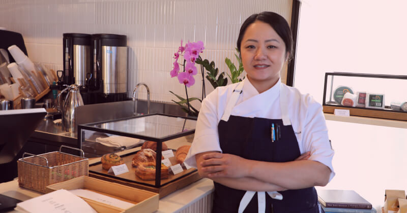 A photo of Diane Moua at Diane's Place, her bakery and restaurant