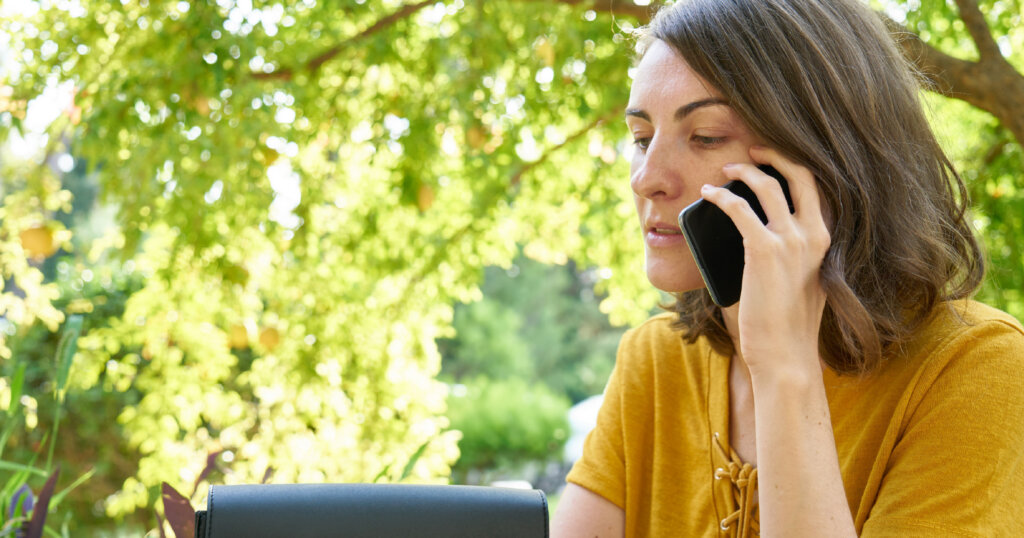 A young person on the phone.